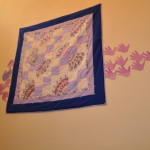 One of many beautiful, hand-made quilts donated by Eastside Quilters for our shelter.