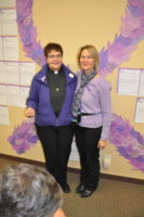 Rev. Dr. Anne Curtin and Ms. Kathryn Allen at an event for domestic violence awareness.