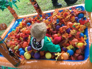back of girl in ball pit
