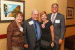 Freida and Prentiss Carnell are greeted by Diane (pink rose) and Dave Pascone.