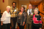Linda Lewis (center) with volunteers: board member Jim Slavin and the Three Musketeers: Louise, Charleena, and Clara.