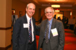 Unity House CEO Chris Burke greets longtime volunteer, Mike Roche.